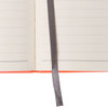 A5 full colour notebook with lined pages and a grey ribbon bookmark. The cover is orange. Features branding.