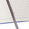 A B5 notebook with a full colour cardboard cover, featuring lined pages and a grey ribbon bookmark.