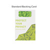 A green and white backing card featuring a sliding webcam cover, with a geometric design and a branding logo.