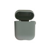 A grey silicone case designed for AirPods, featuring a fitted opening and smooth finish.