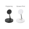 A black and a white MagSafe 2-in-1 wireless charger on a flat surface, each with a circular charging pad.