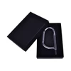 A black cardboard gift box containing a silver carabiner inside. The box is slightly open.
