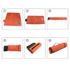 An orange picnic blanket with patterns, featuring folding instructions through six diagrammatic steps.
