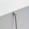 A silver pull-up banner featuring a grey support clip at the top, designed for countertop display.