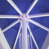 A round market umbrella with a blue canopy and a white frame, showcasing its interior structure and support.