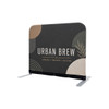 A café barrier featuring a dark background with abstract patterns in beige and white, displaying the text "Urban Brew".