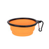 An orange collapsible silicon bowl with a black rim and a carabiner clip.