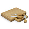 A bamboo cheese board with a rectangular shape and three wooden-handled cheese knives.