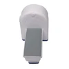 A white and grey stress reliever shaped like a scanner machine, featuring a flat base and rounded top.