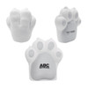 A dog paw-shaped stress reliever in white, featuring a logo on one side.