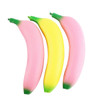 A collection of three banana-shaped stress relievers in pink and yellow colours with green tips.