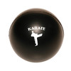 A black stress ball shaped like a karate ball, featuring a silhouette of a martial artist and a logo.
