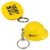 A yellow keyring featuring a helmet-shaped stress reliever with a keychain attachment. It has a logo on one side.