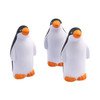 Three penguin-shaped stress relievers in black, white, and orange colours, featuring rounded forms and a glossy finish.