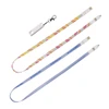 A colourful 6 in 1 polyester lanyard charging cable with multiple connectors and a clip for attachment.