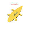 A yellow crocodile-shaped promotional product with a logo on its body.