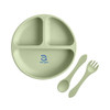 A green silicone kids suction plate featuring three sections, accompanied by a spoon and fork, with a logo.