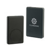 A black aluminium power bank with a circular magnetic area, featuring a logo on one side.