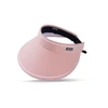 A pink wide brim sun visor hat with a black adjustable strap and a logo on the side.
