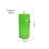 A drink bottle with a collapsible design, made of green material, featuring a spray nozzle and a logo.