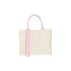 A horizontal canvas tote bag in cream with pink handles and straps, featuring a logo on the side.