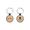 A round wooden keyring featuring a bamboo design with two sides, one showing a logo and branding.