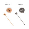 A stainless steel cocktail drink stirrer in rose gold and black, featuring branding on the circular end.