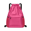 A pink Multi-Pocket Drawstring Backpack featuring a front zip pocket and black straps. It includes a logo.