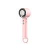 A pink personal cooling fan with a circular fan head and buttons on the side, featuring a hanging loop.