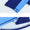 A crew neck raglan tee shirt in navy and light blue polyester micro mesh, featuring flatlock seams and a logo.
