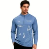 A blue men's pullover features a 1/4 zip and fishing-themed designs, including fish and nautical elements.