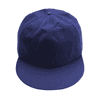 A giant navy baseball cap with a solid design and a curved brim. It features a logo on the side.
