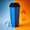 A drink bottle in blue with a black lid, featuring condensation, alongside ice cubes on a split background.