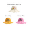 A collection of three Raw Edge Bucket Hats in cream, yellow, and pink, each with different decorative styles and logos.