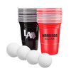 A set of red and black plastic cups with white ping pong balls, featuring a logo on one cup.