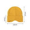 A yellow earflap beanie with ribbed texture, measuring 21cm in height and 22cm in width.