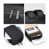 A black travel backpack featuring zippered closures, padded straps, and compartments for a laptop and documents.