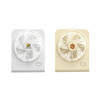 A mini desk fan in white and cream colours, featuring branded logos on both devices.