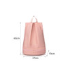 A pink backpack with a handle and two compartments, featuring a zipper on the bottom section.