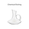 A wine decanter with a curved body and handle, made of clear glass, featuring a seamless design.