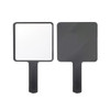 A handheld square mirror with a black handle and a reflective surface on one side and matte black on the other.