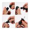 A black round car hook bracket being assembled, featuring a hook and ball joint.