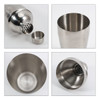 A stainless steel cocktail shaker with a strainer, showcasing its polished interior and exterior. Features a logo.