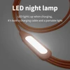 A 6-in-1 night light charging cable in orange, featuring an LED light integrated into the design.