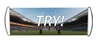 A pull-out banner displaying a rugby field with goalposts and stadium seating, featuring a large "TRY!" text.