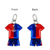 A reflective keychain in the shape of a blue and red sports shirt with matching shorts, featuring a logo.