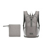 A large packable camping backpack in grey, alongside a small, matching storage pouch. The backpack features ergonomic straps and pockets.