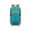 A packable hiking backpack in teal with orange accents and mesh side pockets, featuring zippers and attachment points.