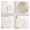 A white ceramic mug with a handle, featuring a magnetic base and a smooth interior. It has a logo on the bottom.