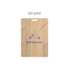 A bamboo name tag featuring a UV print design with multicoloured graphics and a hole for attachment.